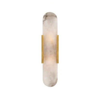 A sleek, elongated wall sconce with a soft white marble body accented by two vertical brass bars.