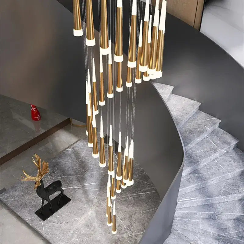 Modern gold and white cone-shaped decorbites black stair chandelier pendant light hanging above staircase