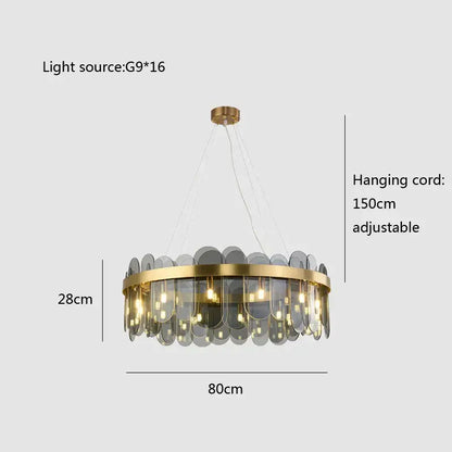 Modern gold and blue glass chandelier with circular frame and gray glass discs for elegant dining lighting solution