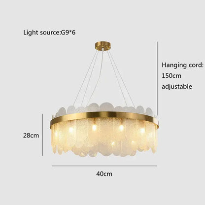 Modern gold and blue glass chandelier with frosted leaf-shaped shades and brass frame lighting solution for dining table