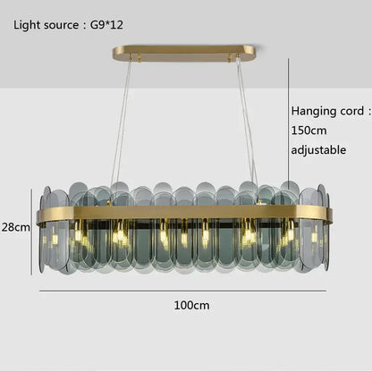 Modern gold and blue glass chandelier with rectangular metal frame and gray panels lighting solution for dining table