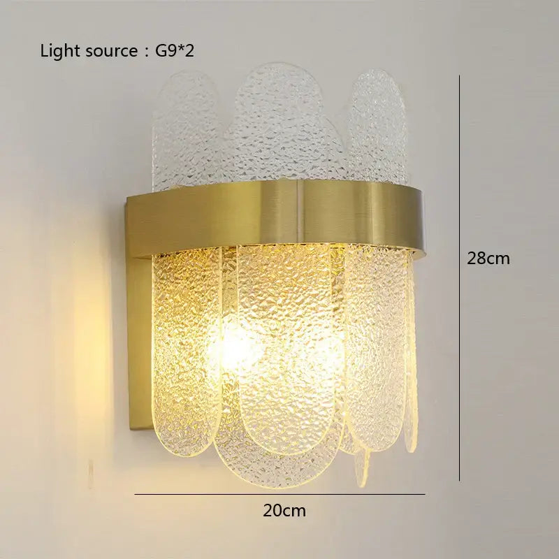 Modern gold and blue glass chandelier wall sconce with textured translucent panels enhances dining experience lighting solution