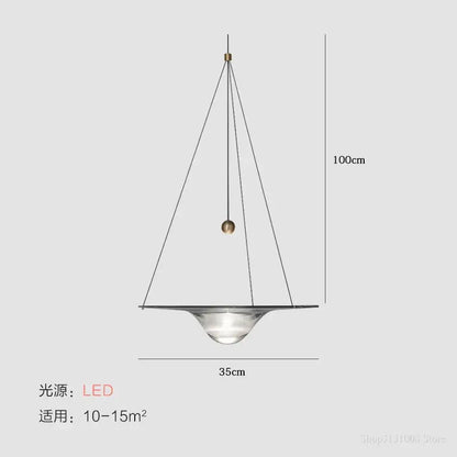 Modern gold and clear glass pendant lights featuring a sleek transparent glass base and polished brass accents for bedroom decorbites clear glass pendant