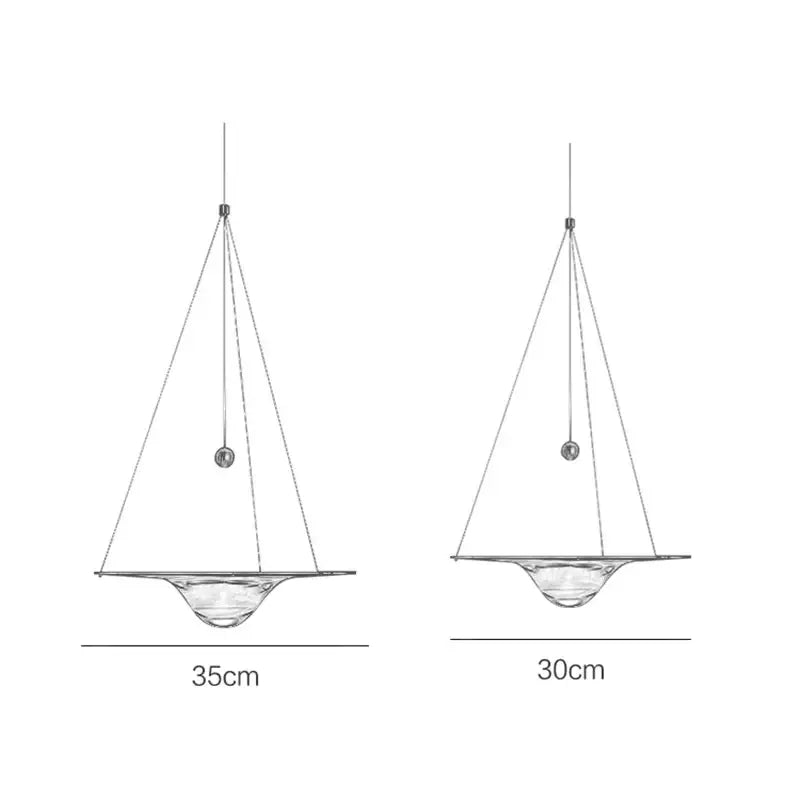 Two modern gold and clear glass pendant lights with triangular frames and metallic spheres for bedroom decorbites clear glass decor
