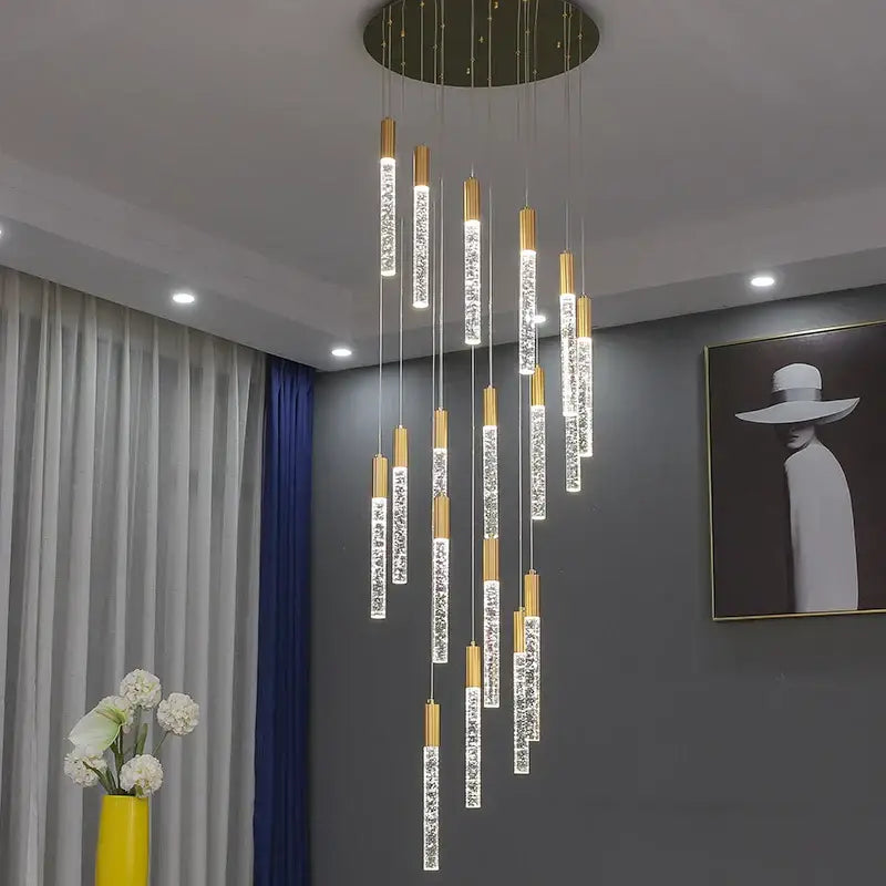 Modern gold and crystal cylindrical stair chandelier with a circular ceiling mount for decorbites cylindrical stair decor