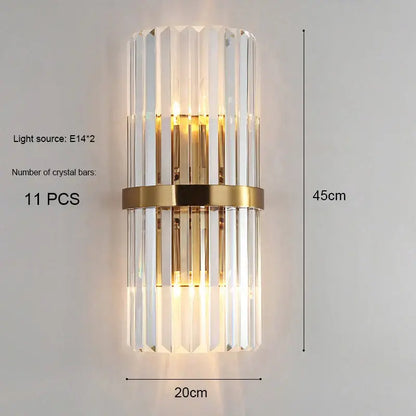Elegant modern gold and crystal wall light with vertical crystal bars and central gold-toned accent for decorbites crystal wall decor
