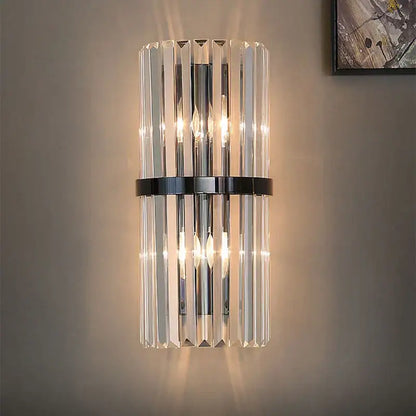 Modern gold and crystal wall light featuring vertical crystal rods with sleek chrome and black accents for living room decorbites crystal wall