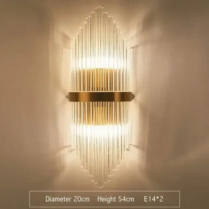 Modern gold and glass led wall lamp with vertical clear glass rods in a fan pattern for bedroom use