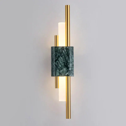 Modern gold wall lamp featuring green marble accent band and gold-toned metal rods for elegant bedroom lighting