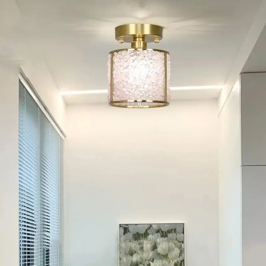 Modern ceiling light with gold-toned metal frame and textured pink glass shade for decorbites copper canopy led