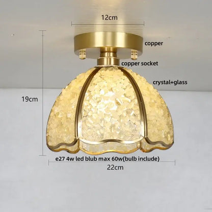 Modern gold and pink bedroom ceiling light with gold-toned copper and textured amber decorbites column glass crystal shade
