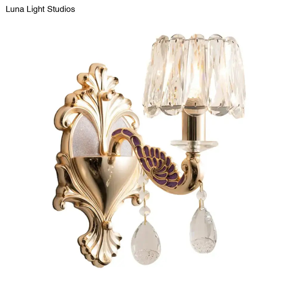 Gold-toned modern wall sconce with purple drum shade e12 e14 featuring ornate peacock feather design and crystal accents