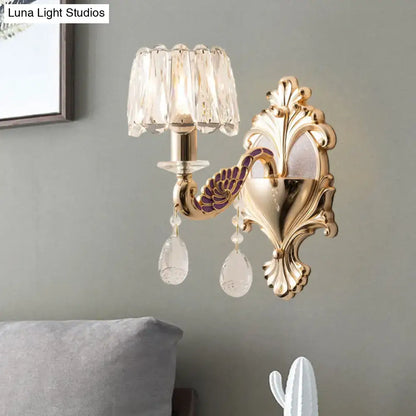 Modern gold and purple peacock wall sconce with crystal drum shade and teardrop crystals compatible with e12 e14 bulbs
