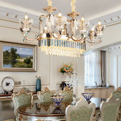 Modern gold and teal crystal candle chandelier with intricate crystal droplets and blue-tinted glass by decorbites crystal