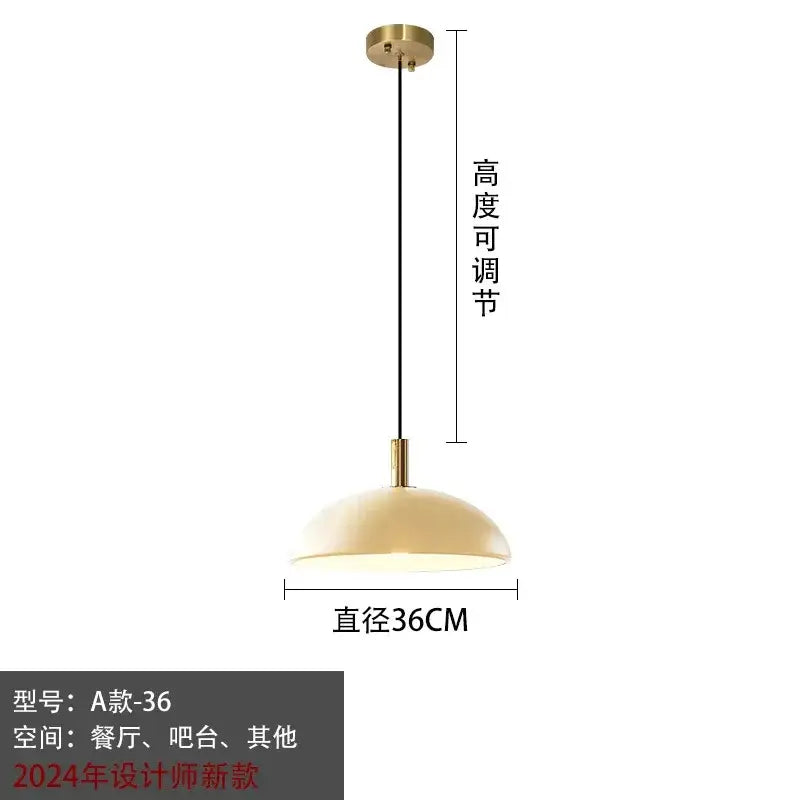 Modern gold glass pendant light with brass finish dome shade and adjustable height for kitchen dining room use