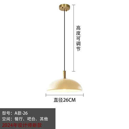 Modern gold glass pendant light with brass finish dome shade and adjustable height for kitchen dining room