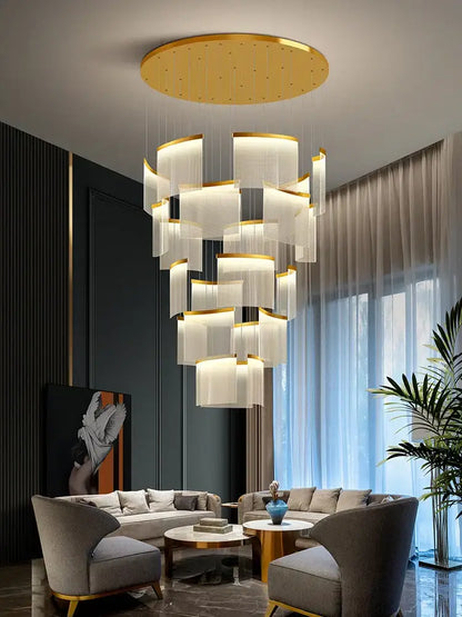 Modern gold and white decorbites acrylic led chandelier with circular fixture and cascading translucent panels for living room