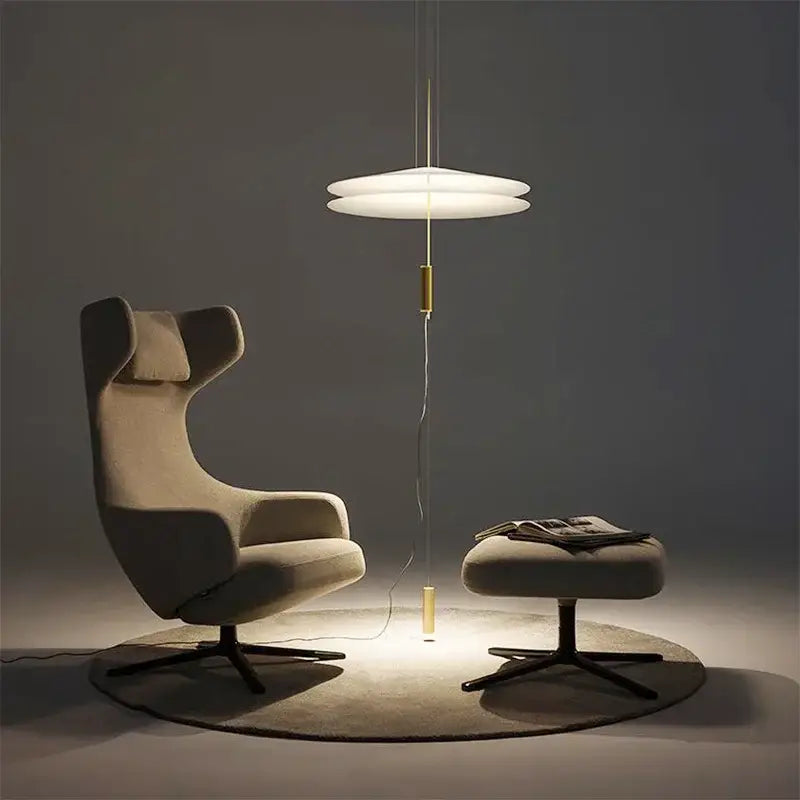 Modern gold and white designer saucer ufo pendant light with layered shade and gold-toned column by decorbites