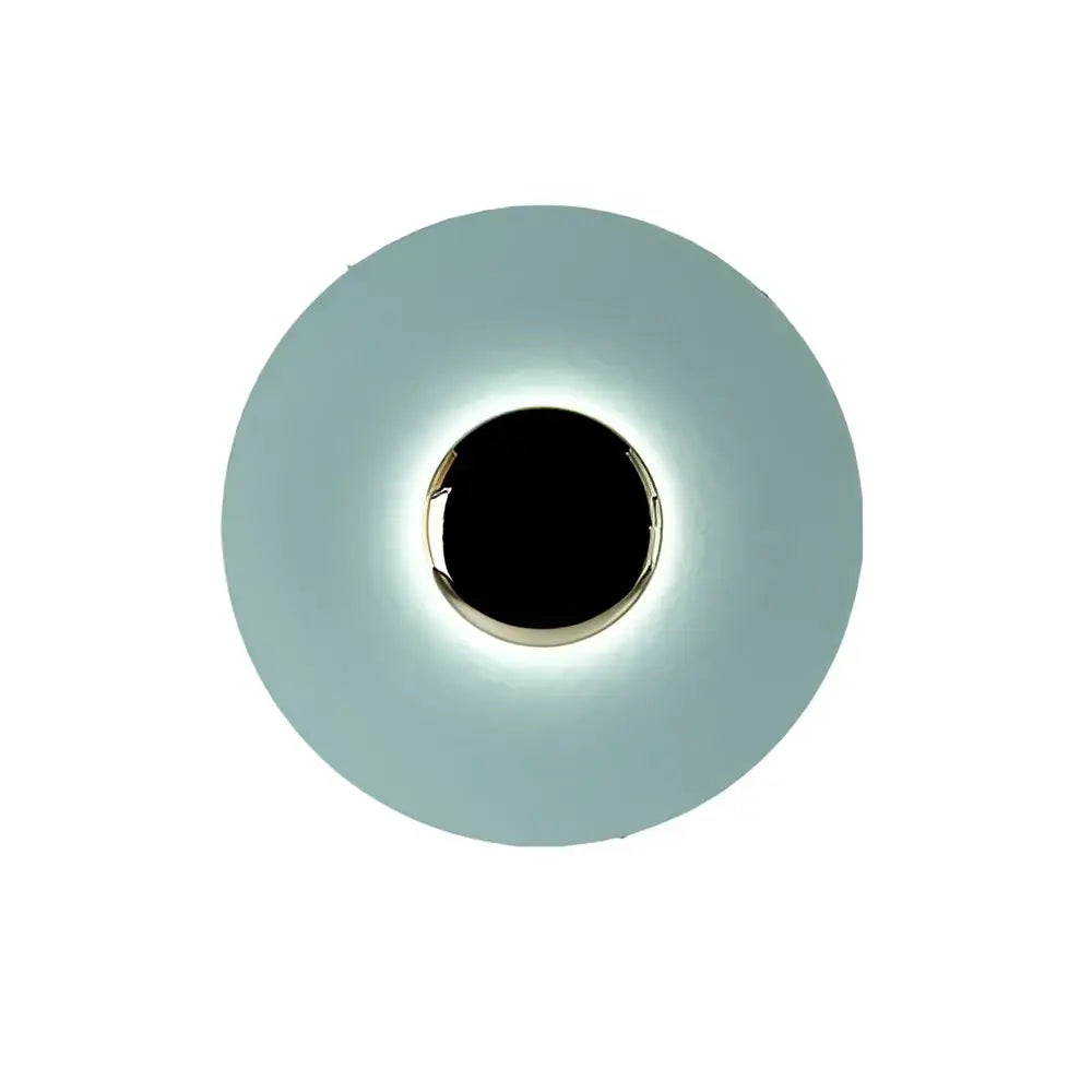 A sleek led ufo wall light with matte teal diffuser and polished chrome ring for modern wall sconces bedside decor
