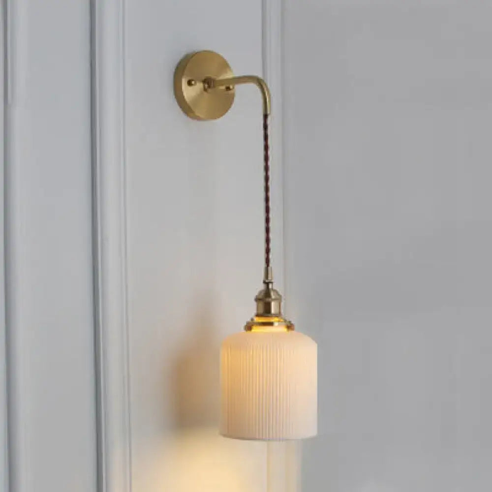 Decorbites modern porcelain wall lamp with warm brass socket and ribbed glass shade ideal for dining room led use