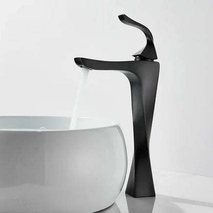 Modern gold angular basin faucet with black matte finish and sleek curved design by decorbites black bronze