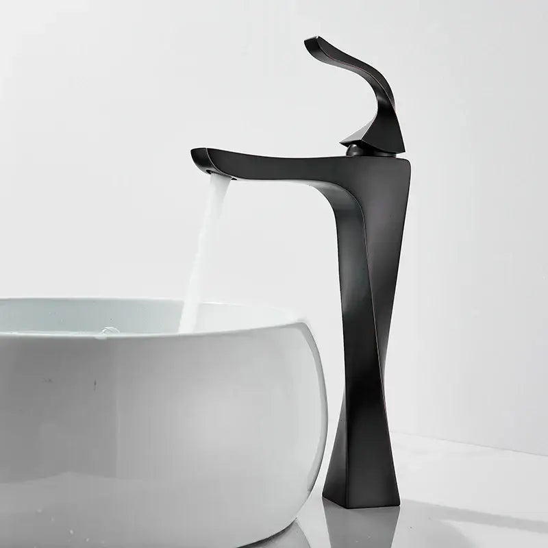 Modern gold angular basin faucet with black matte finish and sleek curved design by decorbites black bronze