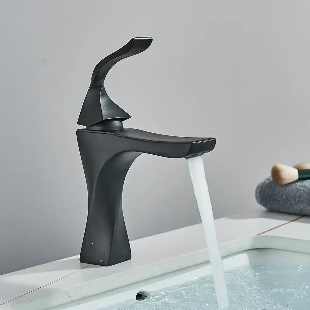 Modern black matte basin faucet with sleek sculptural design and curved spout for decorbites black bronze bathroom