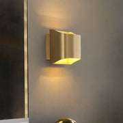 Modern gold angular led wall sconce with sleek design and warm yellow light for living room lighting fixture