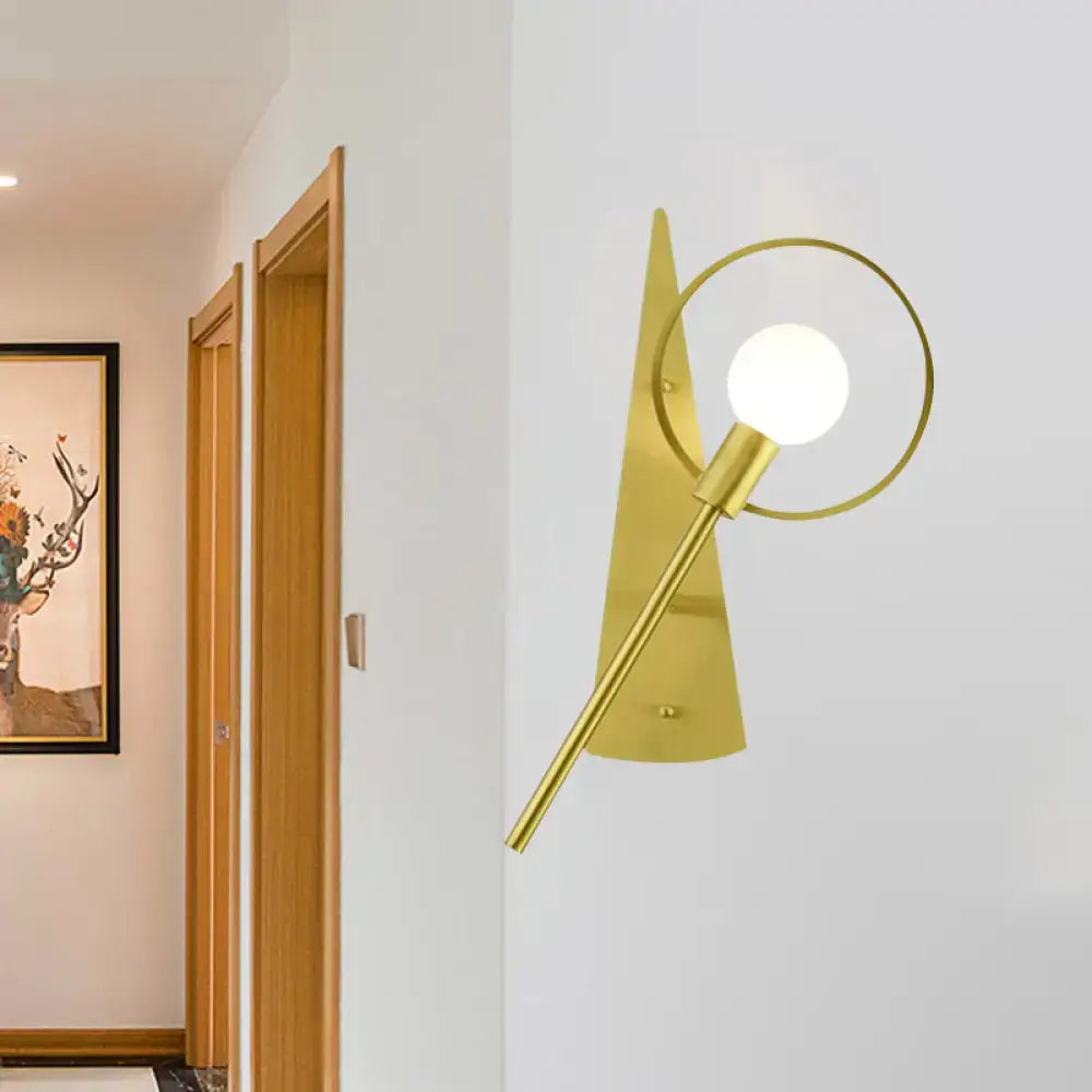 Modern gold angular ring sconce light fixture with sleek circular ring and spherical bulb for bedroom lighting