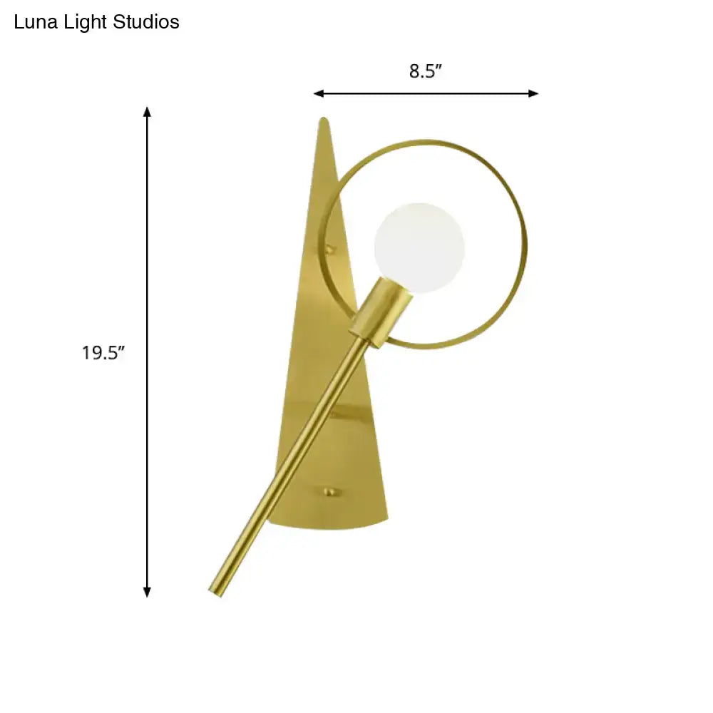 Modern gold angular ring sconce light fixture with sleek backplate framing spherical bulb for bedroom lighting