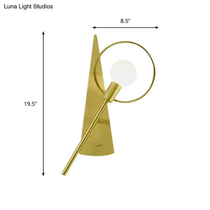 Modern gold angular ring sconce light fixture with sleek backplate framing spherical bulb for bedroom lighting