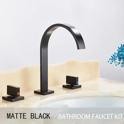 Matte black basin faucet set with sleek arched dual handle spout and square bases featuring red and blue accents