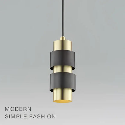Modern gold arched glass bar pendant lamp with alternating black and brass cylindrical rings for stylish decorbites glass bar pendant lighting