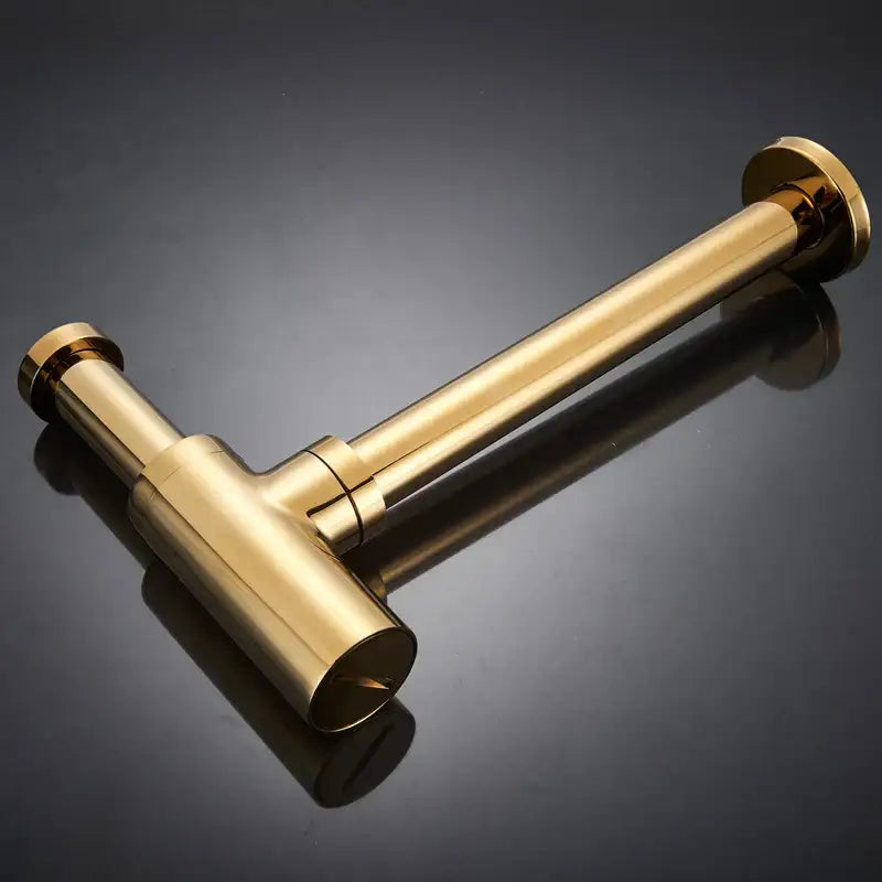 Modern gold brass basin tap kit with t-shaped pipe fitting and polished cylindrical ends for bathroom hardware