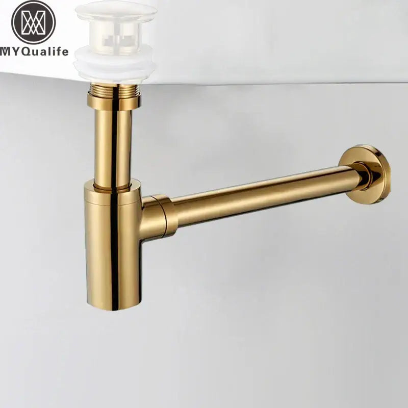 Modern gold basin tap siphon kit with sleek gold-toned drain pipe and clear plastic pop-up stopper for bathroom use