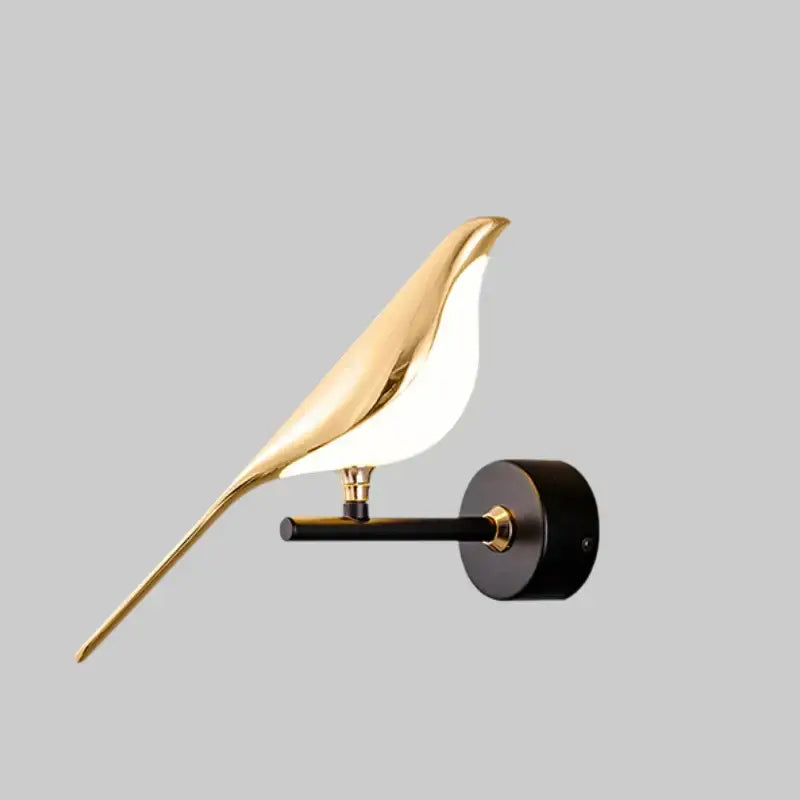 Modern gold bird led wall sconce with sleek minimalist decorbites bird design and glowing white light for bedroom decor
