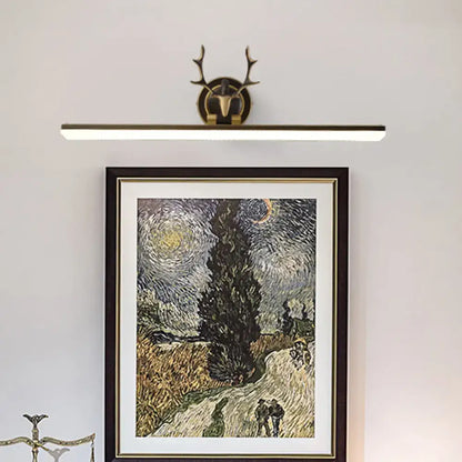 Modern gold and black antler vanity sconce light with brass rectangular bar design for bedroom wall lighting