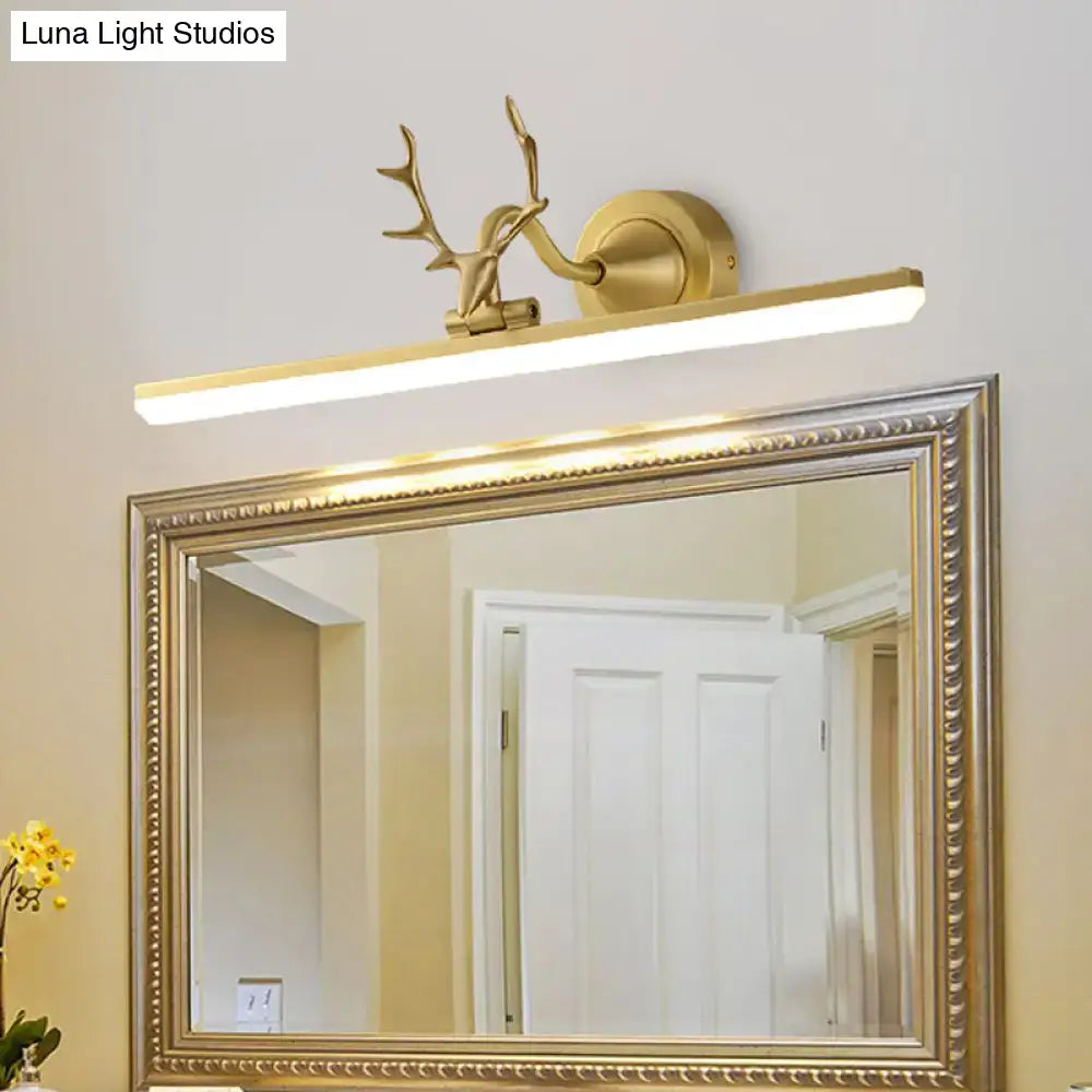 Modern gold and black antler vanity sconce light with gold-toned deer head and rectangular led bar design