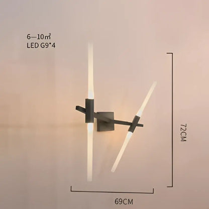Modern black metal wall sconce with two angled led light bars complementing decorbites branch suspension pendant light