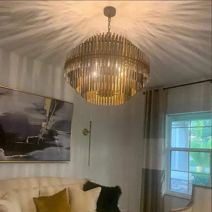 Modern gold and black brass pendant light with vertical crystal rods and circular frame for dining room decorbites brass pendant