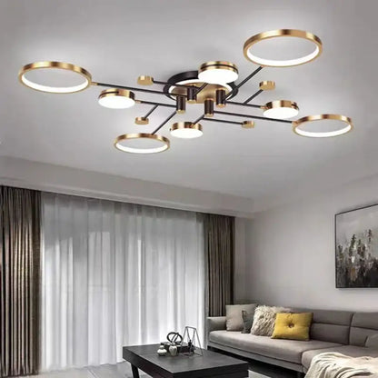 Modern gold black pendant light featuring circular led bulbs with gold rims on a black metal branching frame for living room decorbites gold black