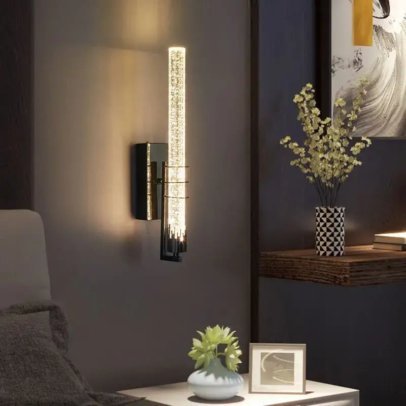 Modern gold and black crystal led wall sconce with vertical illuminated glass tube featuring embedded crystal elements for decorbites crystal led decor