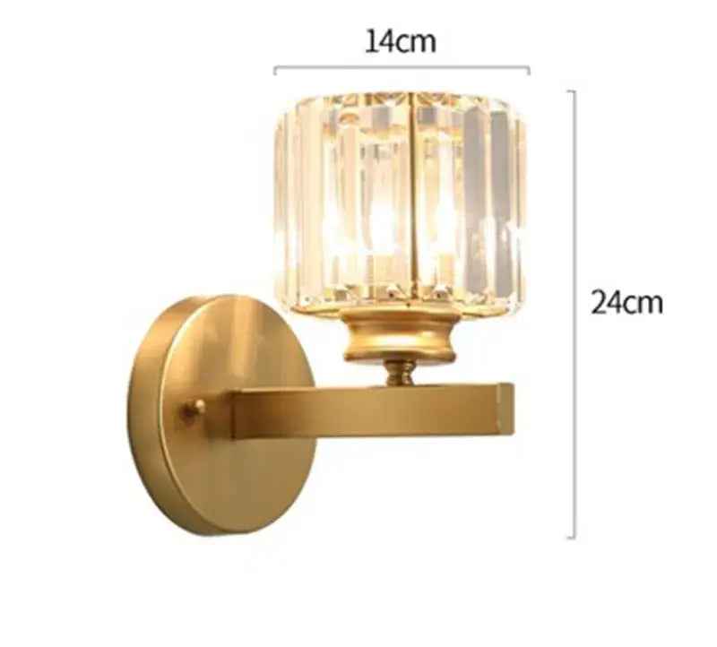 Modern gold and black crystal sconce light featuring a gold-toned wall fixture with faceted decorbites crystal shade