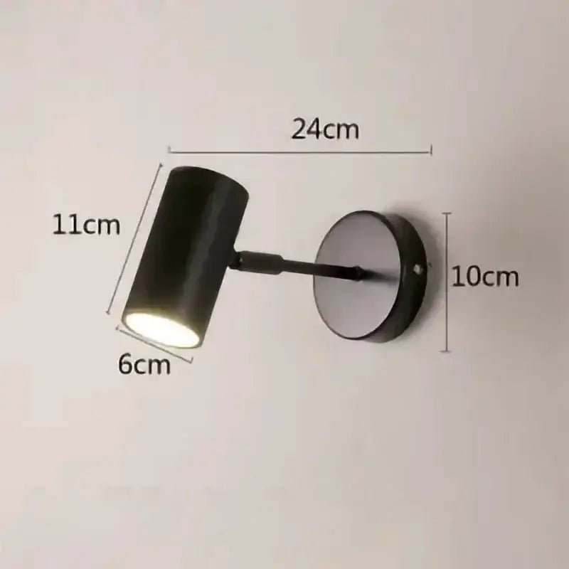Modern gold and black cylindrical led wall lamp with matte finish and adjustable arm for stylish living room decorbites gold led