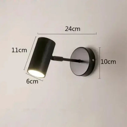 Modern gold and black cylindrical led wall lamp with matte finish and adjustable arm for stylish living room decorbites gold led