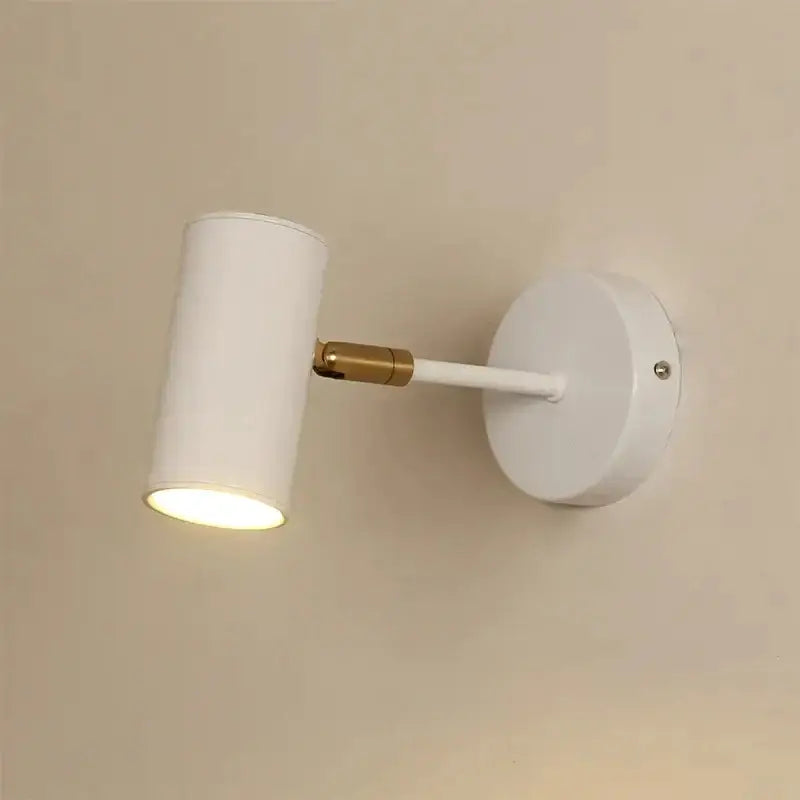 White cylindrical wall lamp with a gold led joint and matte finish for modern living room decorbites gold led lighting