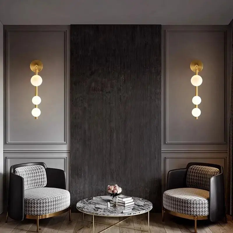 Modern gold-toned wall lights with three frosted glass ball bulbs decorbites glass ball wall for living room decor