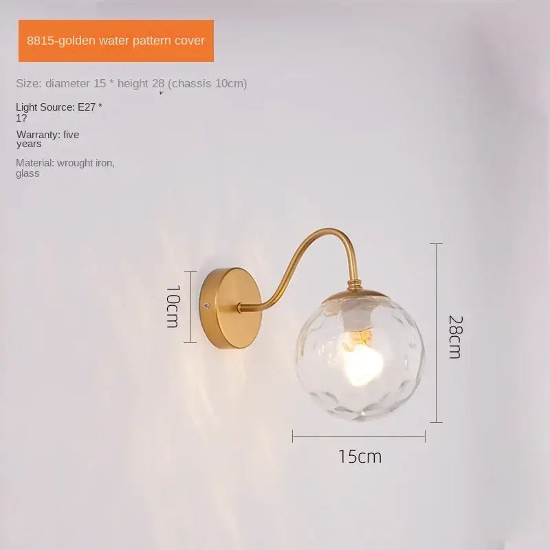 Modern gold and black wall lamp with faceted glass ballight led globe and curved wrought iron arm for bedroom decorbites glass ballight
