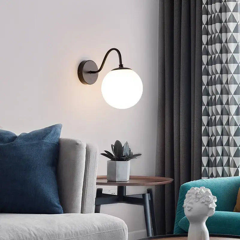 Black metal wall lamp with round frosted glass globe shade modern gold and black decorbites glass ballight led sconce
