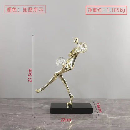 Modern gold and black golden man crystal ball sculpture featuring a dynamic dancer figurine on black base decorbites golden man